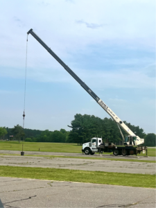a crane in a parking lot